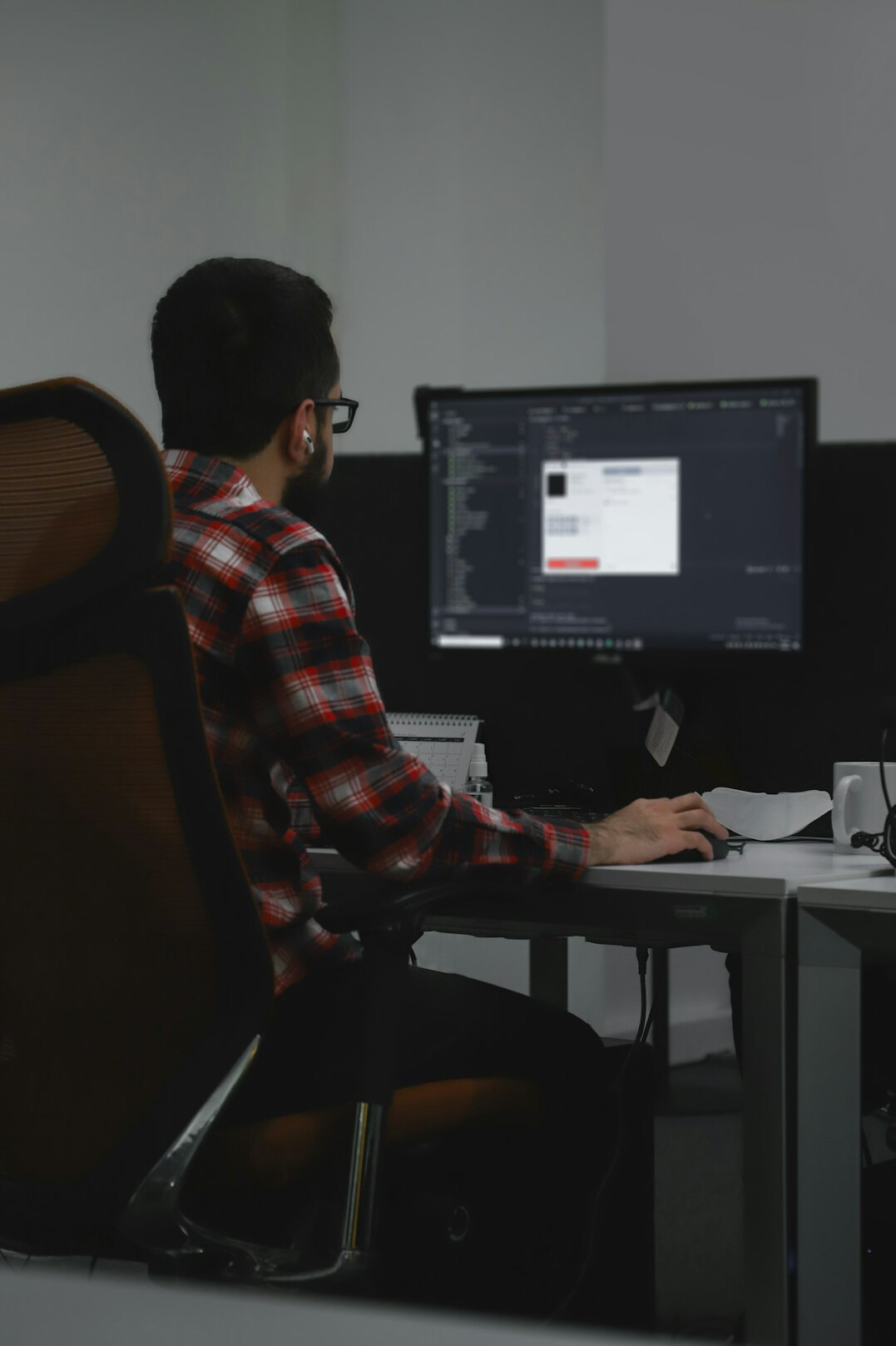 professional developer at desk